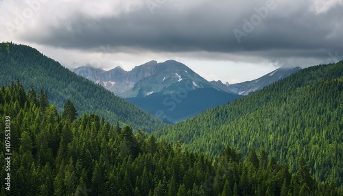 Whispers of the Wild: A Mountain Range Beneath a Moody Sky"