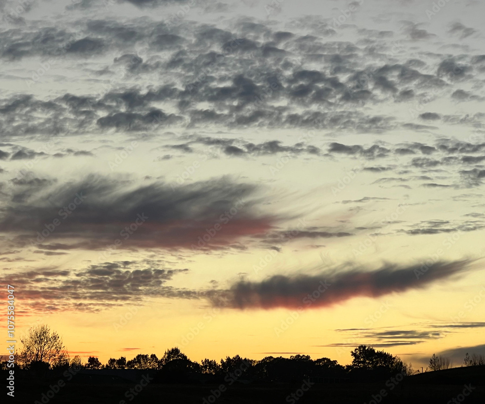 grey and pink clouds with yellow sunset sky background grey and pink clouds with yellow sunset sky background