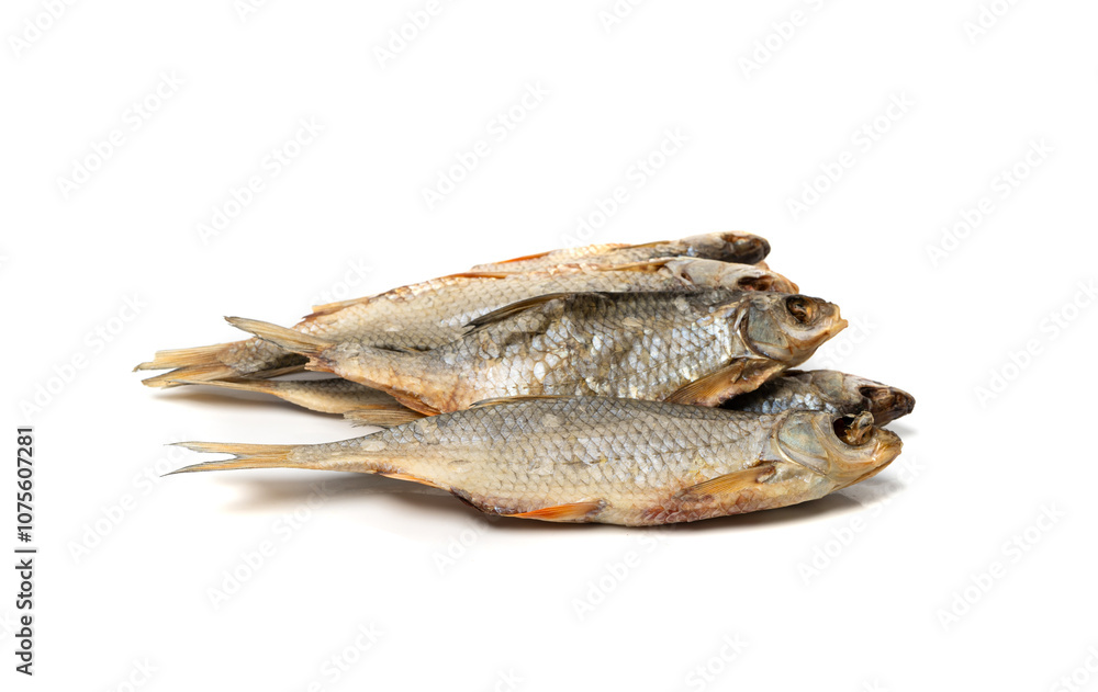 Dry roach, salted fish isolated, dried rutilus, taranka beer snack, whole salted and dried fish, prepared seafood Dry roach, salted fish isolated, dried rutilus, taranka beer snack, whole salted and dried fish, prepared seafood