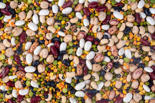Mixed dried legumes and cereals isolated on white background