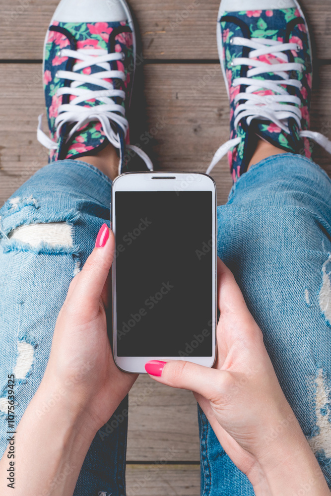 Young woman using smart phone