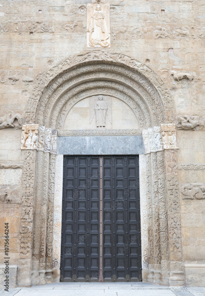Pavia - The main Romanesque portal of church Basilica di San Michaele Maggiore Pavia - The main Romanesque portal of church Basilica di San Michaele Maggiore