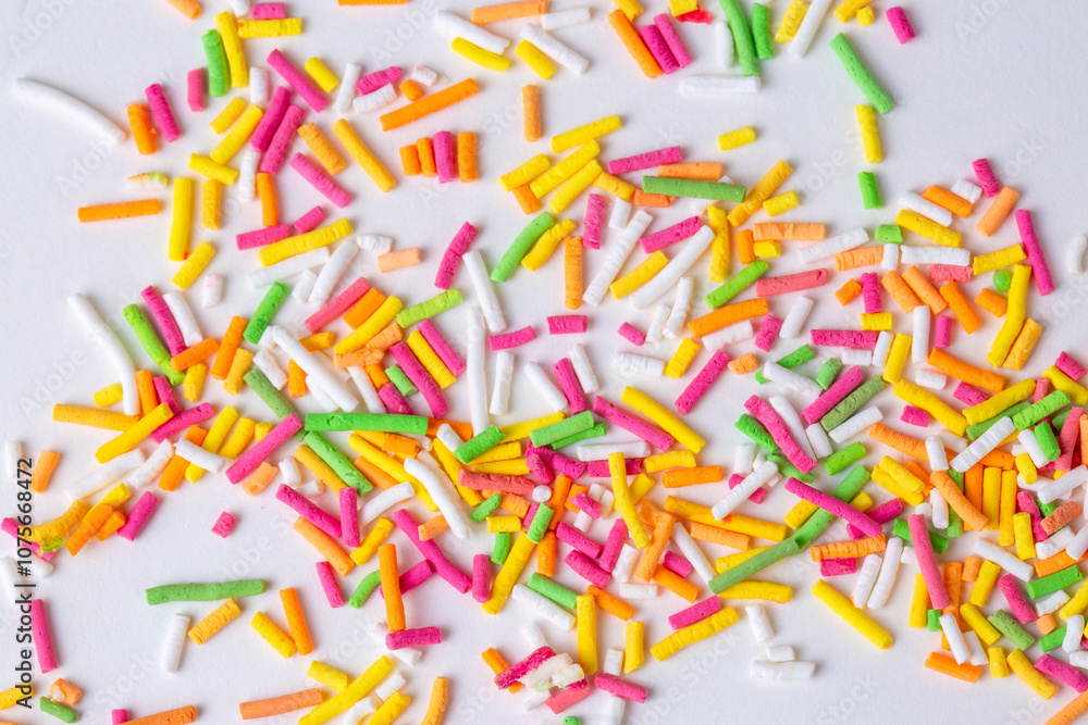 Sugar sprinkle dots, decoration for cake and bakery, a lot of sprinkles, isolated on white background Sugar sprinkle dots, decoration for cake and bakery, a lot of sprinkles, isolated on white background