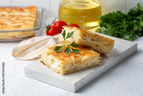 Delicious Turkish food; Tray pastry; (Turkish name; Su boregi)