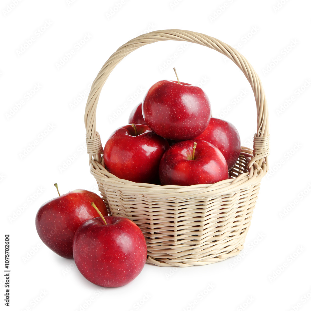 Fresh ripe red apples in wicker basket isolated on white Fresh ripe red apples in wicker basket isolated on white
