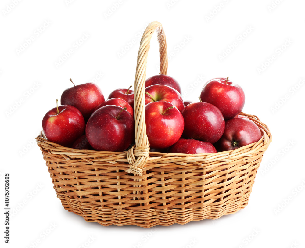 Fresh ripe red apples in wicker basket isolated on white Fresh ripe red apples in wicker basket isolated on white