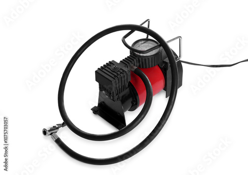 Air compressor with hose isolated on white photo