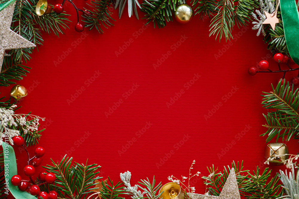 custom made wallpaper toronto digitalChristmas flat lay. Green fir branches, red berries, ribbon and golden ornaments on red background. Merry Christmas. Stylish christmas frame with space for text. Xmas background