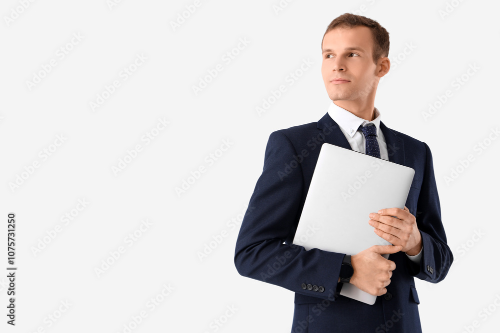 Handsome businessman in suit with laptop on white background Handsome businessman in suit with laptop on white background