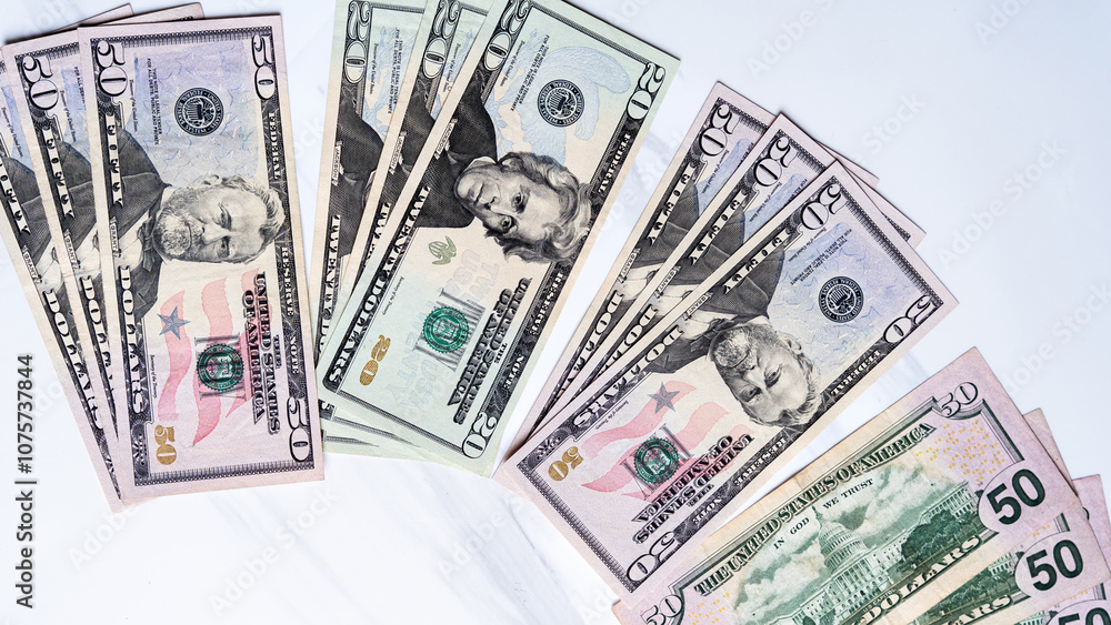 Spread of US Dollar Bills Representing Wealth and Finance Spread of US Dollar Bills Representing Wealth and Finance