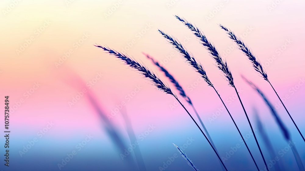 A serene landscape featuring tall grass swaying gently against a pastel gradient sky at dusk. A serene landscape featuring tall grass swaying gently against a pastel gradient sky at dusk.