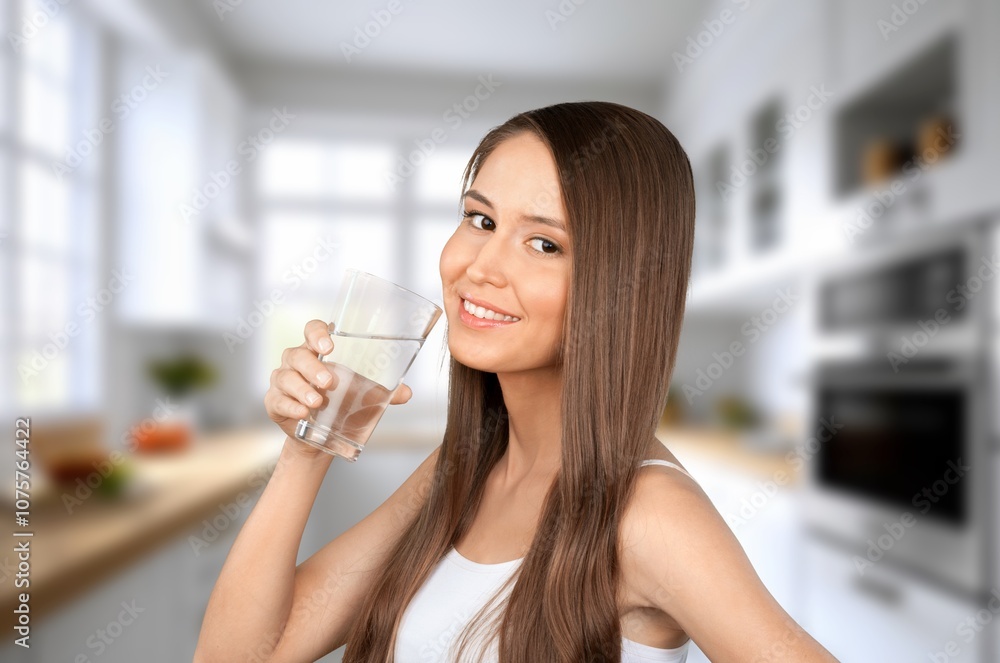 Dehydrated young woman drinks water from glass Dehydrated young woman drinks water from glass