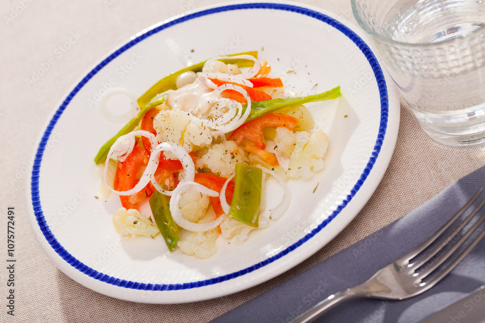 Cauliflower vegetable salad with stewed green beans and pepper Cauliflower vegetable salad with stewed green beans and pepper