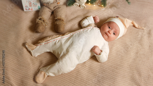 Newborn baby lies on Christmas and New Year Eve.