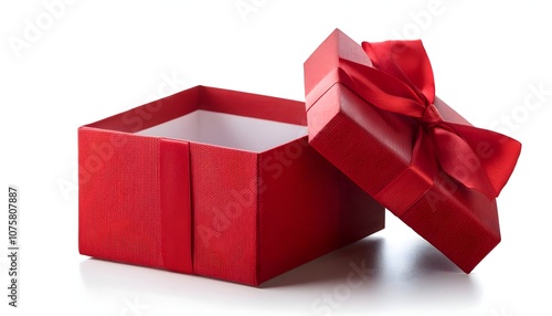 Open empty red gift box with red ribbon bow on white background, flat lay, top view photo