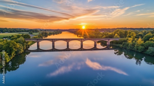 A high-resolution aerial shot of a railway bridge crossing