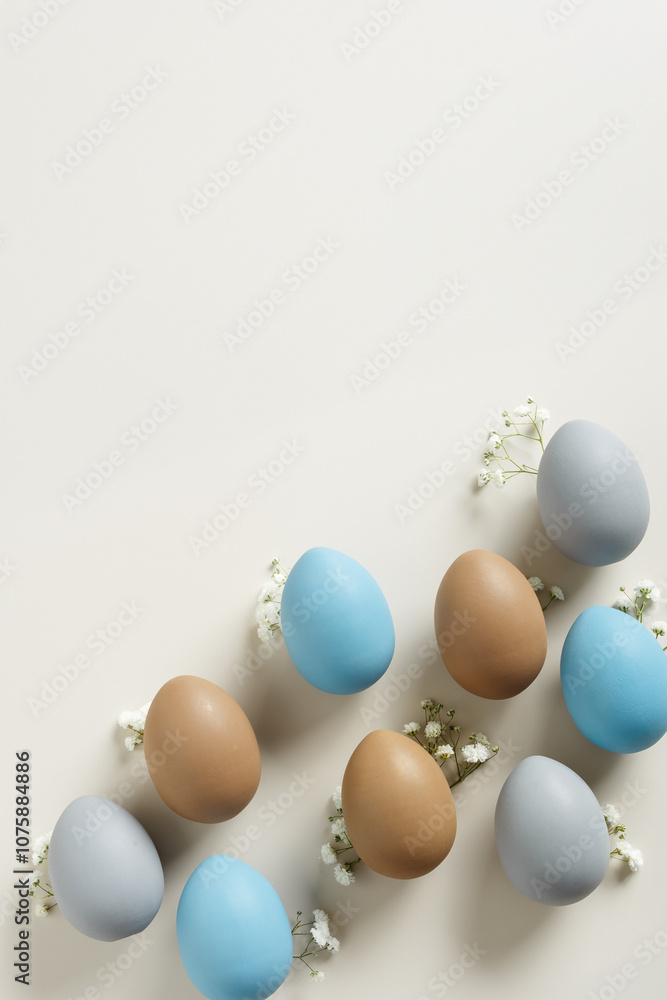 Elegant Easter Composition with Pastel Eggs and Spring Blossoms, still life Dyed eggs in soft pastel colors, top view spring holiday minimal creative pattern, neutral earth colored image, above Elegant Easter Composition with Pastel Eggs and Spring Blossoms, still life Dyed eggs in soft pastel colors, top view spring holiday minimal creative pattern, neutral earth colored image, above