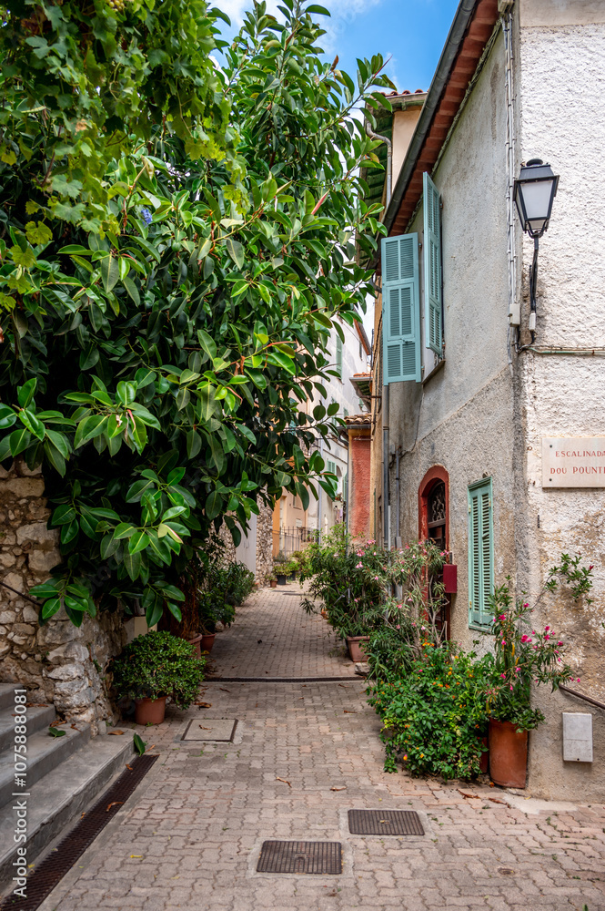 Naklejka premium Old town city street in the French city of Villefranche Sur Mer.