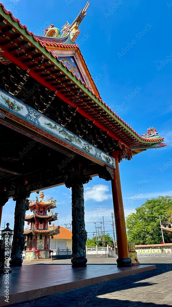 Fototapeta premium Entrance to an unusually beautiful temple - Satya Dharma Temple - the pearl of Buddhist culture on the island of Bali
