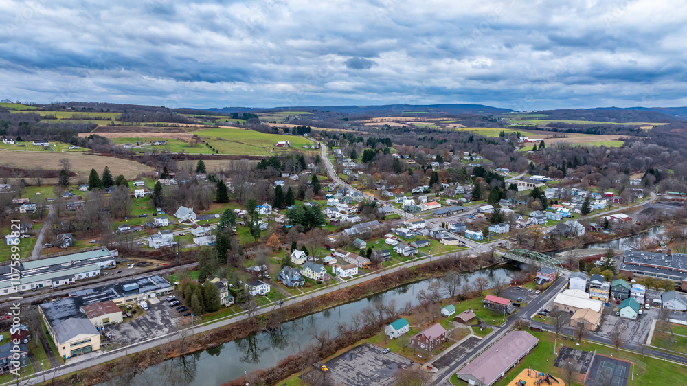 Fototapeta premium Aerial image over Marathon, NY on a cloudy, overcast fall afternoon, November 11, 2024.