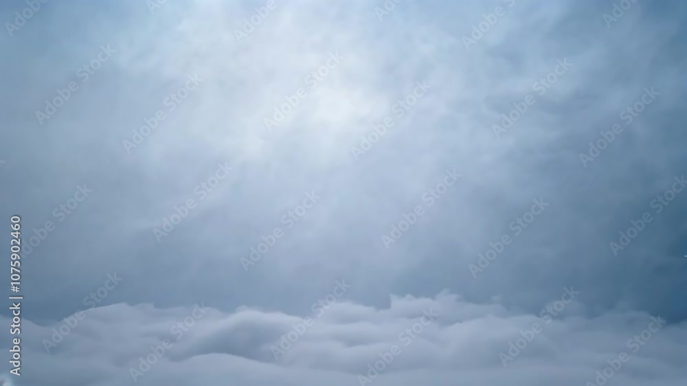 Witness the tranquil sight of clouds drifting gently in the morning sky, illuminated by the soft light of sunrise, creating a peaceful atmosphere Witness the tranquil sight of clouds drifting gently in the morning sky, illuminated by the soft light of sunrise, creating a peaceful atmosphere