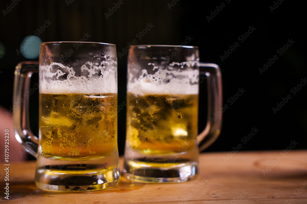 Two frothy pints of beer sit on a wooden bar counter, creating a warm, inviting pub atmosphere. Perfectly chilled with a golden glow, they evoke a sense of relaxation and camaraderie. Two frothy pints of beer sit on a wooden bar counter, creating a warm, inviting pub atmosphere. Perfectly chilled with a golden glow, they evoke a sense of relaxation and camaraderie.