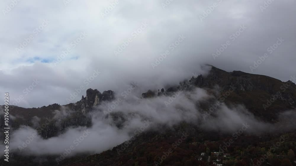 White clouds covering a mountain are nature's embrace and admiring them brings with it nostalgia and a cold ambiance that provokes feelings of peaceful White clouds covering a mountain are nature's embrace and admiring them brings with it nostalgia and a cold ambiance that provokes feelings of peaceful