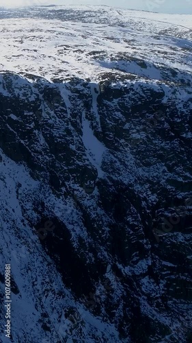 Wallpaper Mural Fly above Mountain Covered by Snow. Serra da Estrela Portugal vertical video Torontodigital.ca