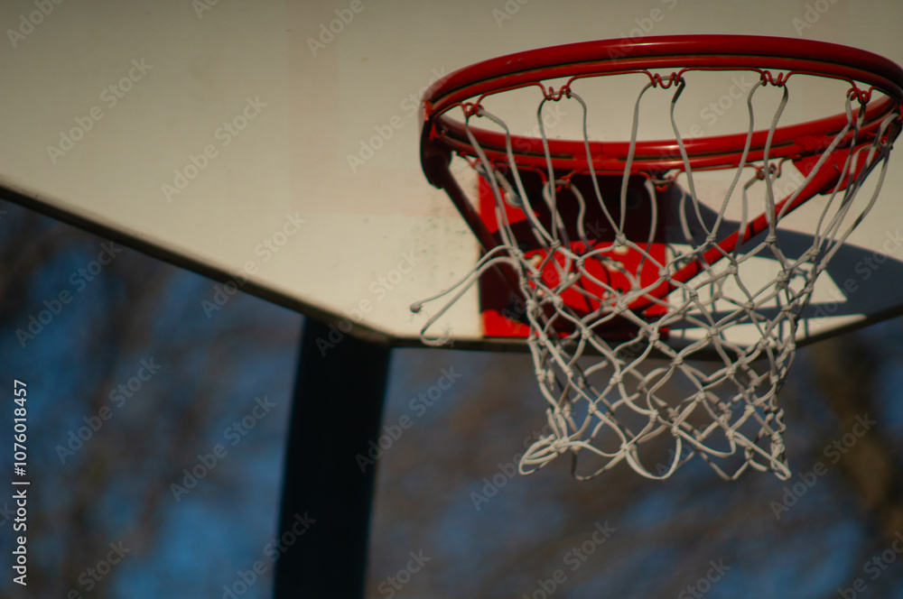 Basketball hoop with worn net Basketball hoop with worn net