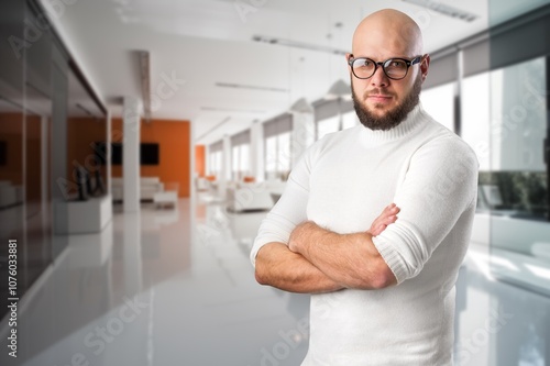 Portrait of a young business man in a modern office