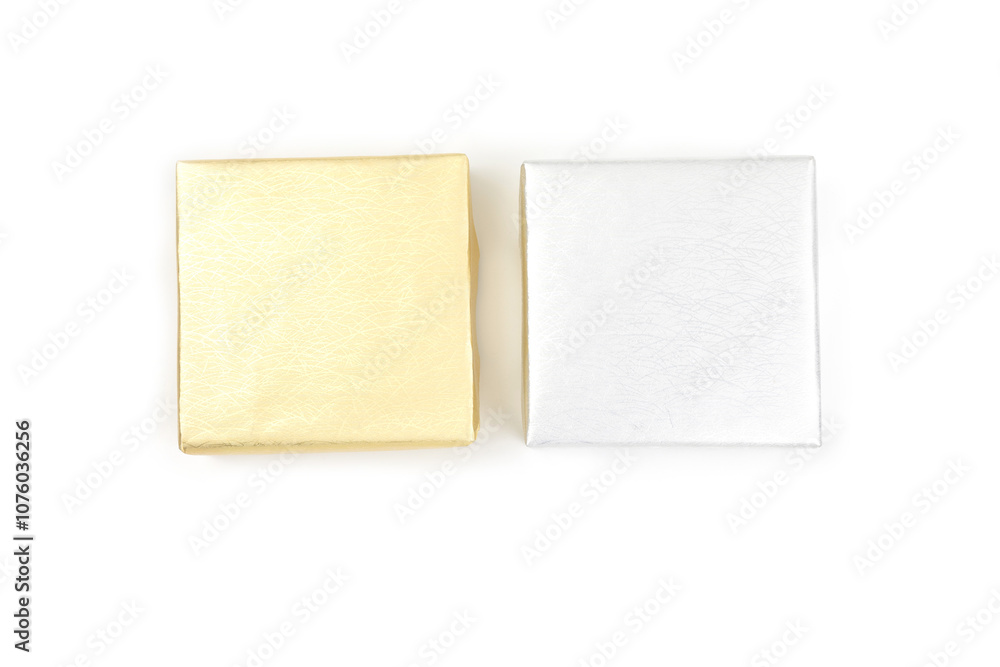 Top view, gold and silver color gift box isolated on a white background. Gift box concept for happy birthday, thank you, congratulation, mother's day, anniversary, Valentine's day, and holiday.. Top view, gold and silver color gift box isolated on a white background. Gift box concept for happy birthday, thank you, congratulation, mother's day, anniversary, Valentine's day, and holiday..