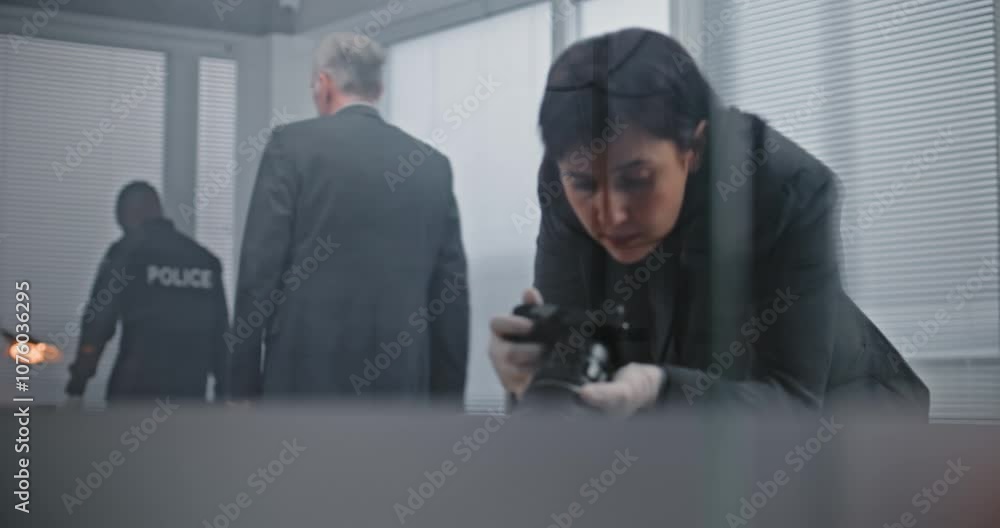 Office robbery or murder case: Female criminalist takes photos of ...