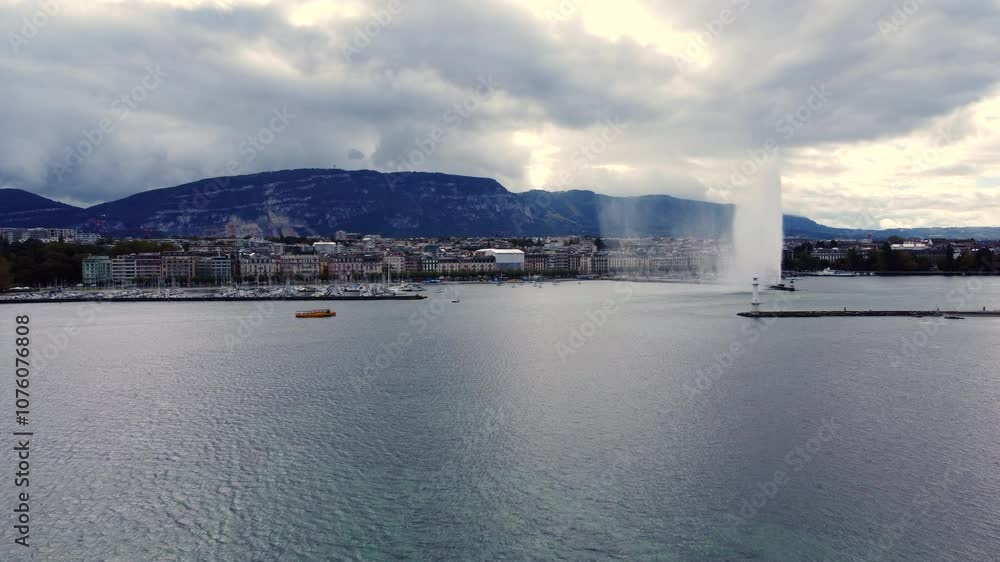 Taxi Boat Lake Geneva City Background with Jet d'Eau Fountain AERIAL Taxi Boat Lake Geneva City Background with Jet d'Eau Fountain AERIAL