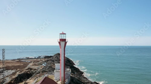 Cape Forchu Lighthouse in Canada, Nova Scotia on the Atlantic Ocean photo