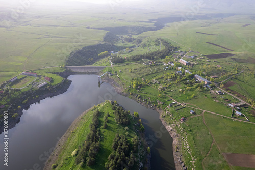 Drone view of Aparan Reservoir and Jrambar village on a spring day. Armenia. photo