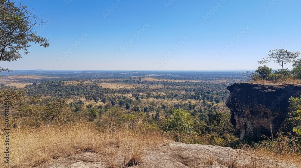 Naklejka premium Expansive View of an Arid Landscape Under Blue Sky