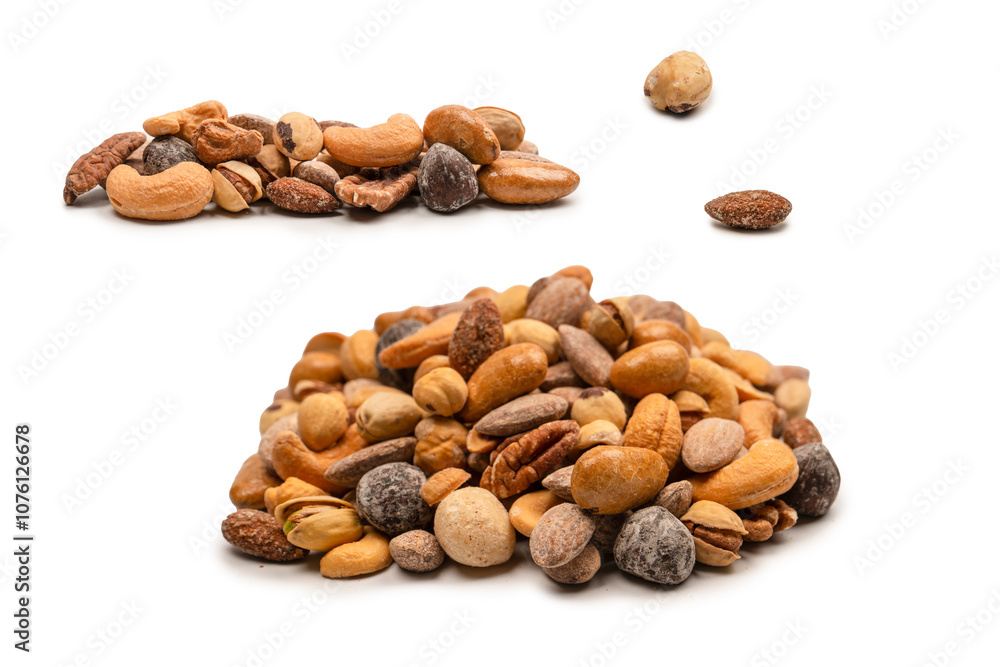 A group of almonds, pistachios, walnuts, macadamia, cashews. A group of almonds, pistachios, walnuts, macadamia, cashews.