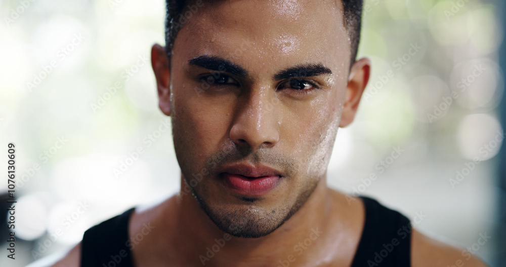 Portrait, sweating and man in break or fitness center for wellness, exercise and rest as athlete. Male person, tired and gym for workout, endurance and cardio with challenge, performance and training Portrait, sweating and man in break or fitness center for wellness, exercise and rest as athlete. Male person, tired and gym for workout, endurance and cardio with challenge, performance and training