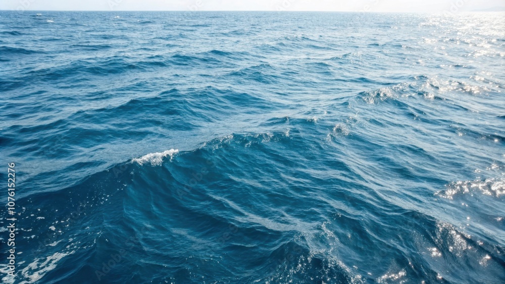 The natural pattern of blue sea surface water, the Texture of natural light, and the waves The natural pattern of blue sea surface water, the Texture of natural light, and the waves