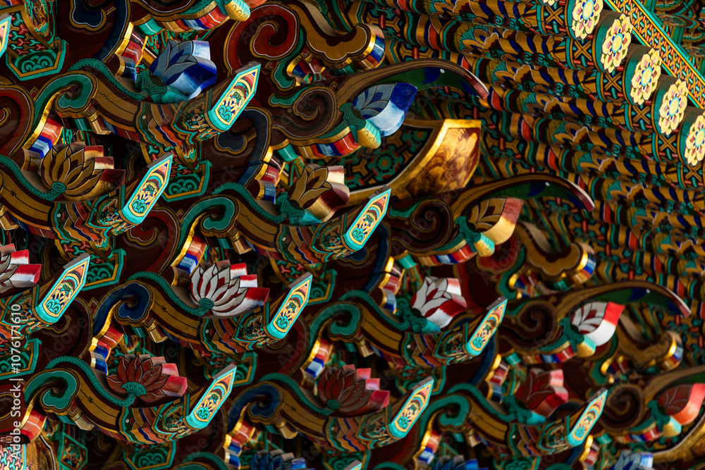 decorated eaves of the traditional Korean building in the Buddhist temple decorated eaves of the traditional Korean building in the Buddhist temple