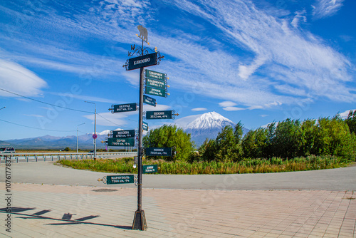 Direction indicator on the background Koryakskaya Sopka volcano. Kamchatka. Russia. photo