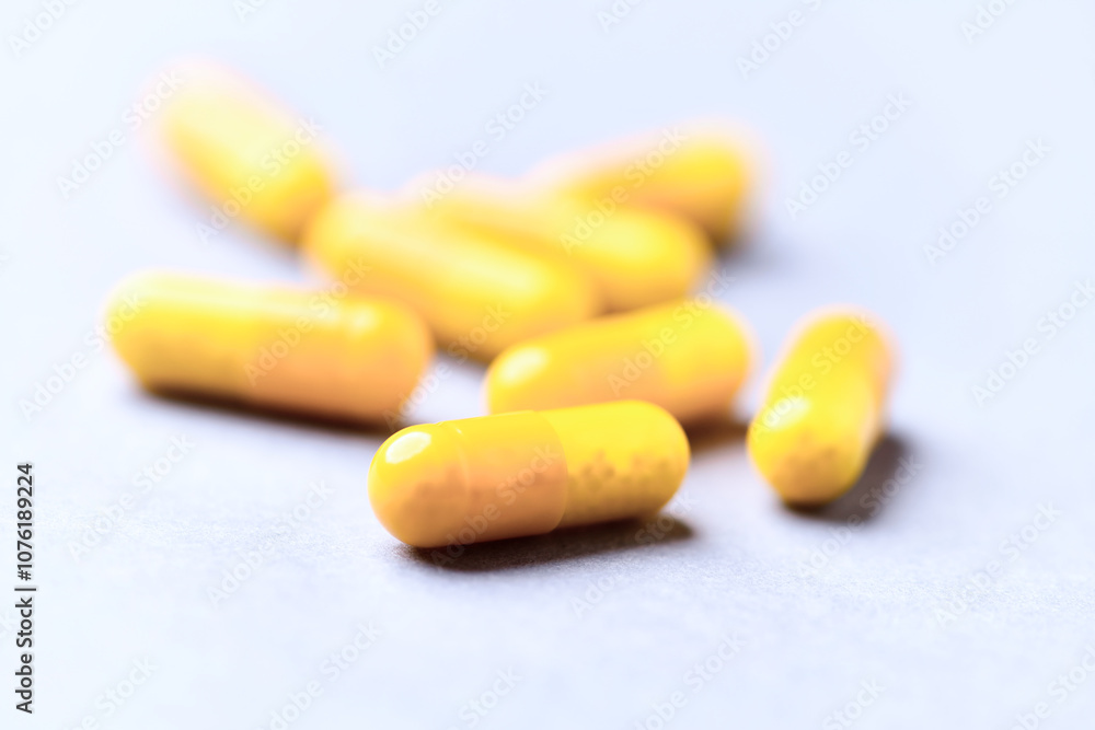 Vitamin C capsules. Bright background. Close up. Copy space. Vitamin C capsules. Bright background. Close up. Copy space.