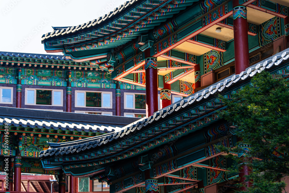 painted eaves of the traditional Korean building in the Buddhist temple building painted eaves of the traditional Korean building in the Buddhist temple building
