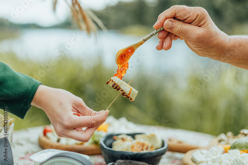 Принти на полотні Sharing Grilled Cheese with Sweet Jam Outdoors