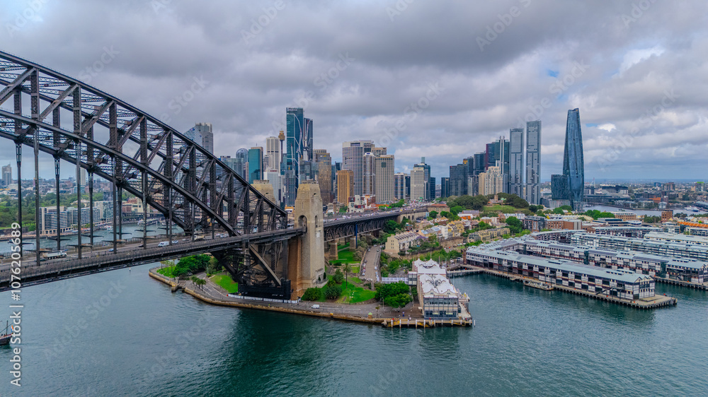 Naklejka premium Aerial Drone view of Sydney Harbour bridge and Harbour foreshore Sydney NSW Australia