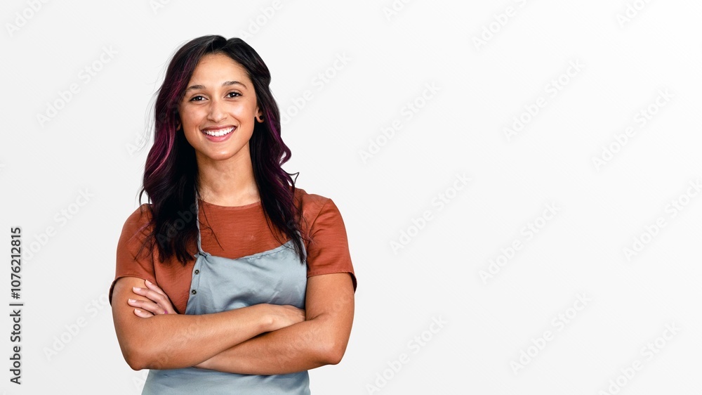Smiling female small business owner at a cash register Smiling female small business owner at a cash register
