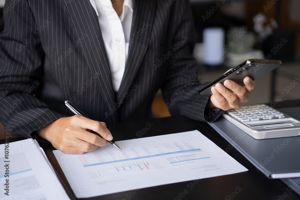 Fototapeta premium Asian Business woman using smart phone spending time checking news social media