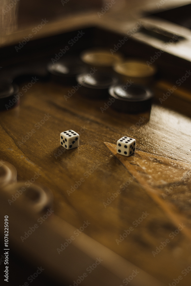 Backgammon Board with Dice and Spinning Piece - Close-Up Shot of Traditional Board Game in Warm Lighting - 6