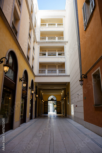 Tableau sur toile Modern alley view in Reggio Emilia, featuring contemporary architecture and slee