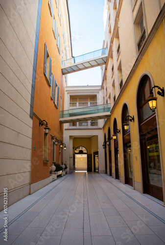 Modern alley view in Reggio Emilia, featuring contemporary architecture and sleek urban design in Italy's cityscape